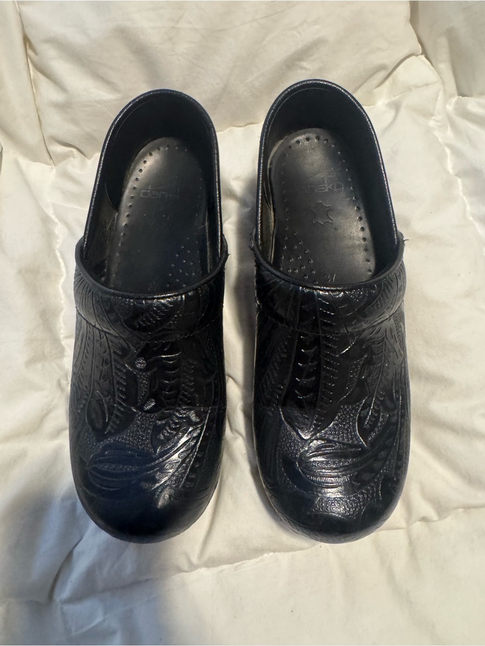 Dansko Black Embossed Leather Clogs
